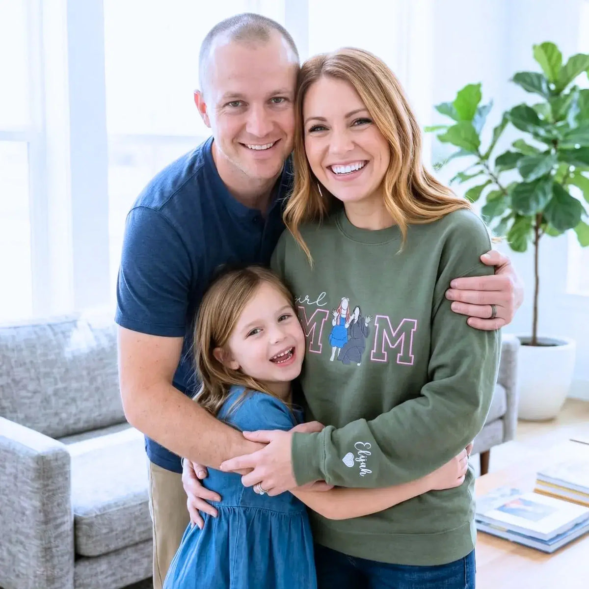 Custom embroidered mom hoodie with portrait from photo and kids names design on sweatshirt front detail