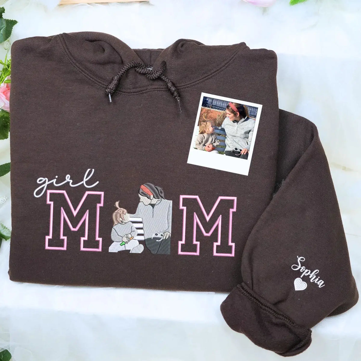 Custom embroidered mom hoodie with portrait from photo and kids names design on sweatshirt front detail