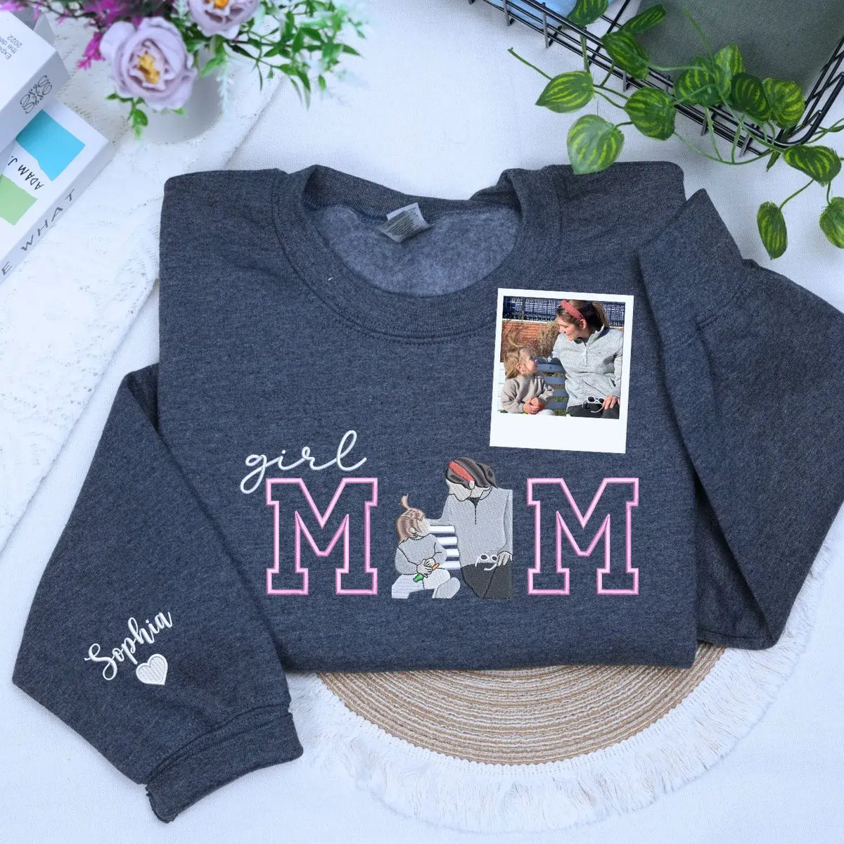 Custom embroidered mom hoodie with portrait from photo and kids names design on sweatshirt front detail