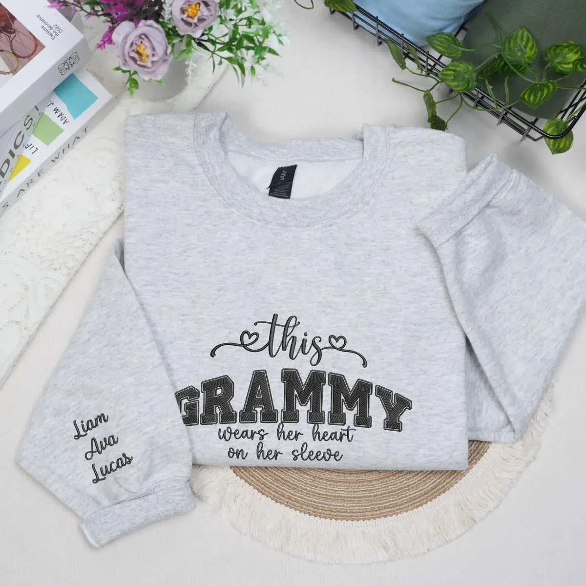 personalized grandma sweatshirt embroidered with grandkids names on sleeve