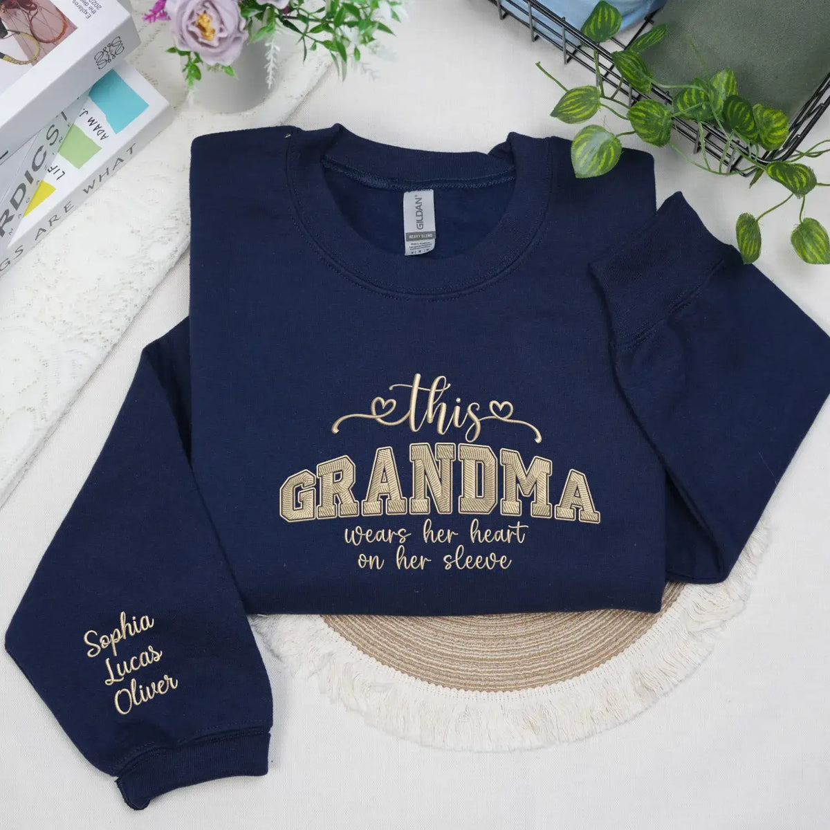 Personalized sweatshirt for grandma with embroidered “This Grandma Wears Her Heart on Her Sleeve” design