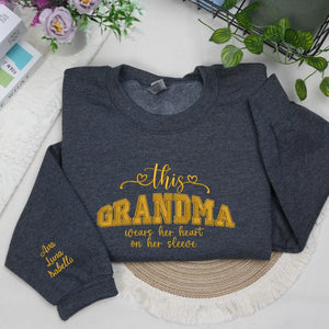 Personalized sweatshirt for grandma with embroidered “This Grandma Wears Her Heart on Her Sleeve” design