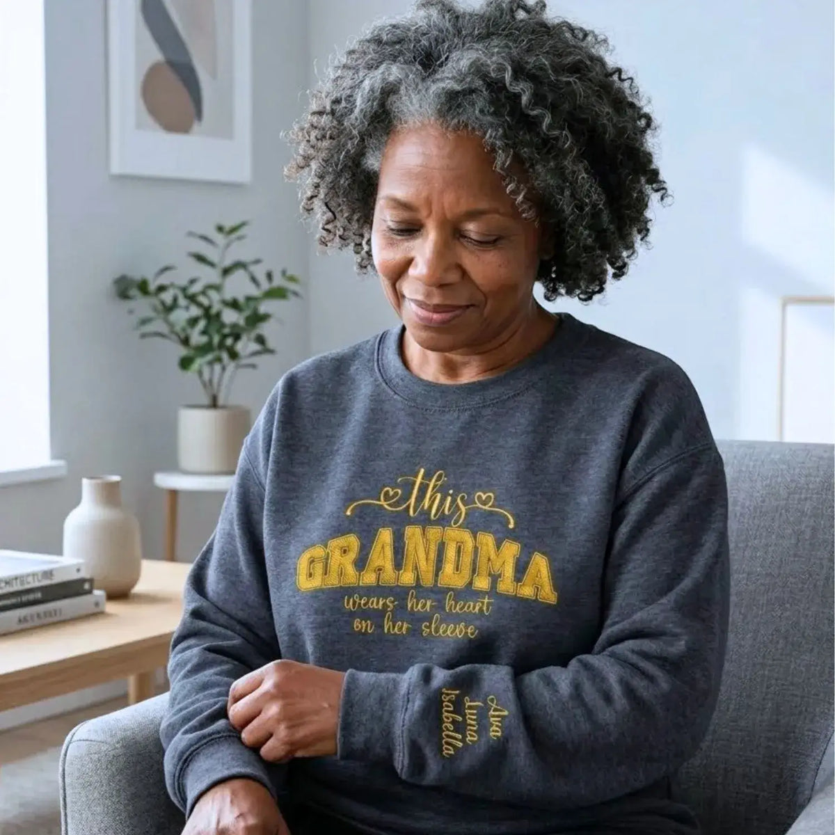 Personalized sweatshirt for grandma with embroidered “This Grandma Wears Her Heart on Her Sleeve” design