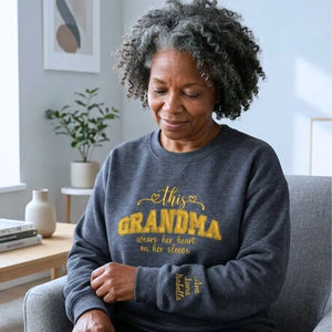 Personalized sweatshirt for grandma with embroidered “This Grandma Wears Her Heart on Her Sleeve” design