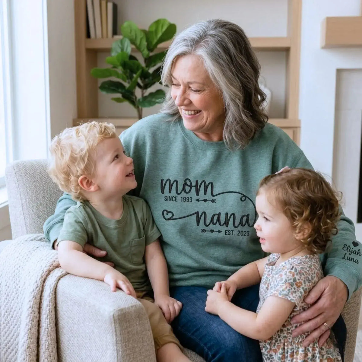 personalized nana sweatshirt with embroidered kids names on sleeve for first time grandma gift