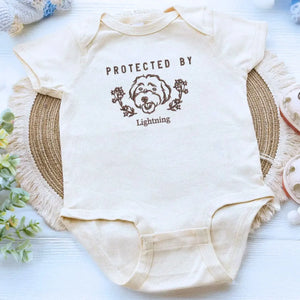 personalized baby onesie with embroidered dog portrait from photo for newborn announcement