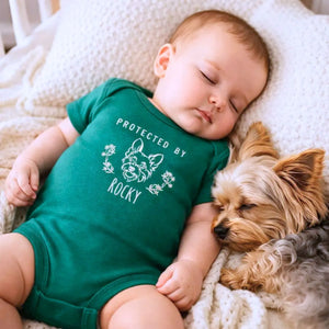 personalized baby onesie with embroidered dog portrait from photo for newborn announcement