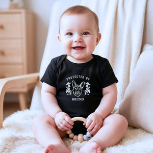 personalized baby onesie with embroidered dog portrait from photo for newborn announcement
