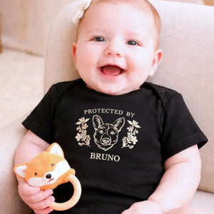 personalized baby onesie with embroidered dog portrait from photo for newborn announcement