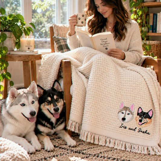 Woman with two dogs under a cream waffle blanket embroidered with their portraits and names, Iris and Sasha, gift for dog mom