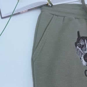 Custom embroidered dog dad shorts with personalized pet portrait stitched from photo