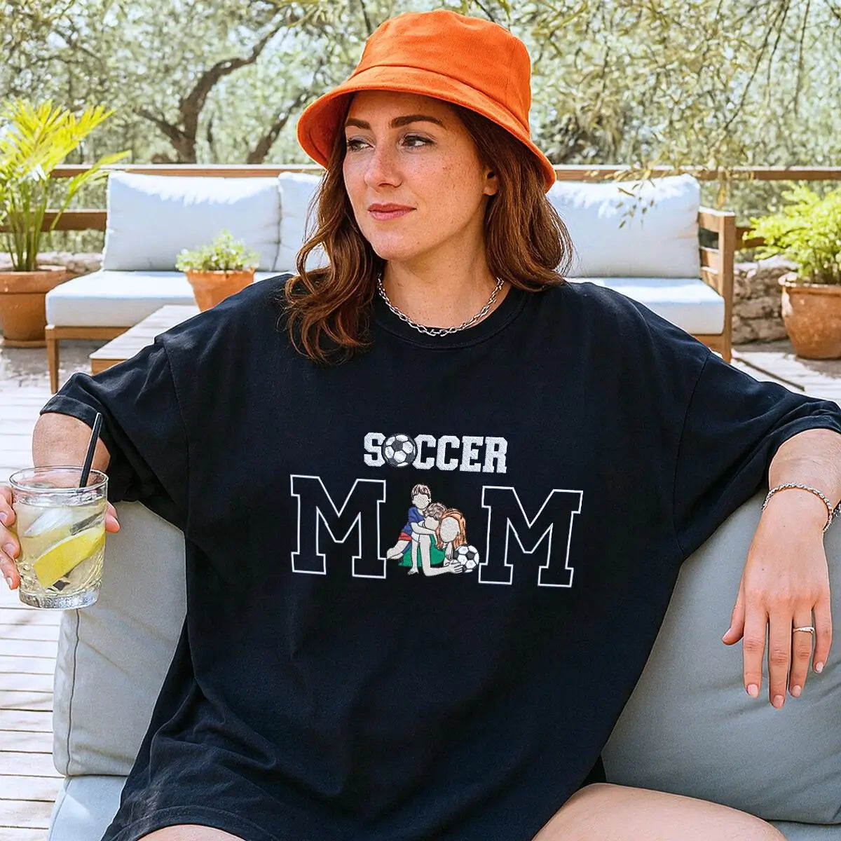 Custom embroidered soccer mom shirt with stitched child photo and sleeve text, perfect for game day pride