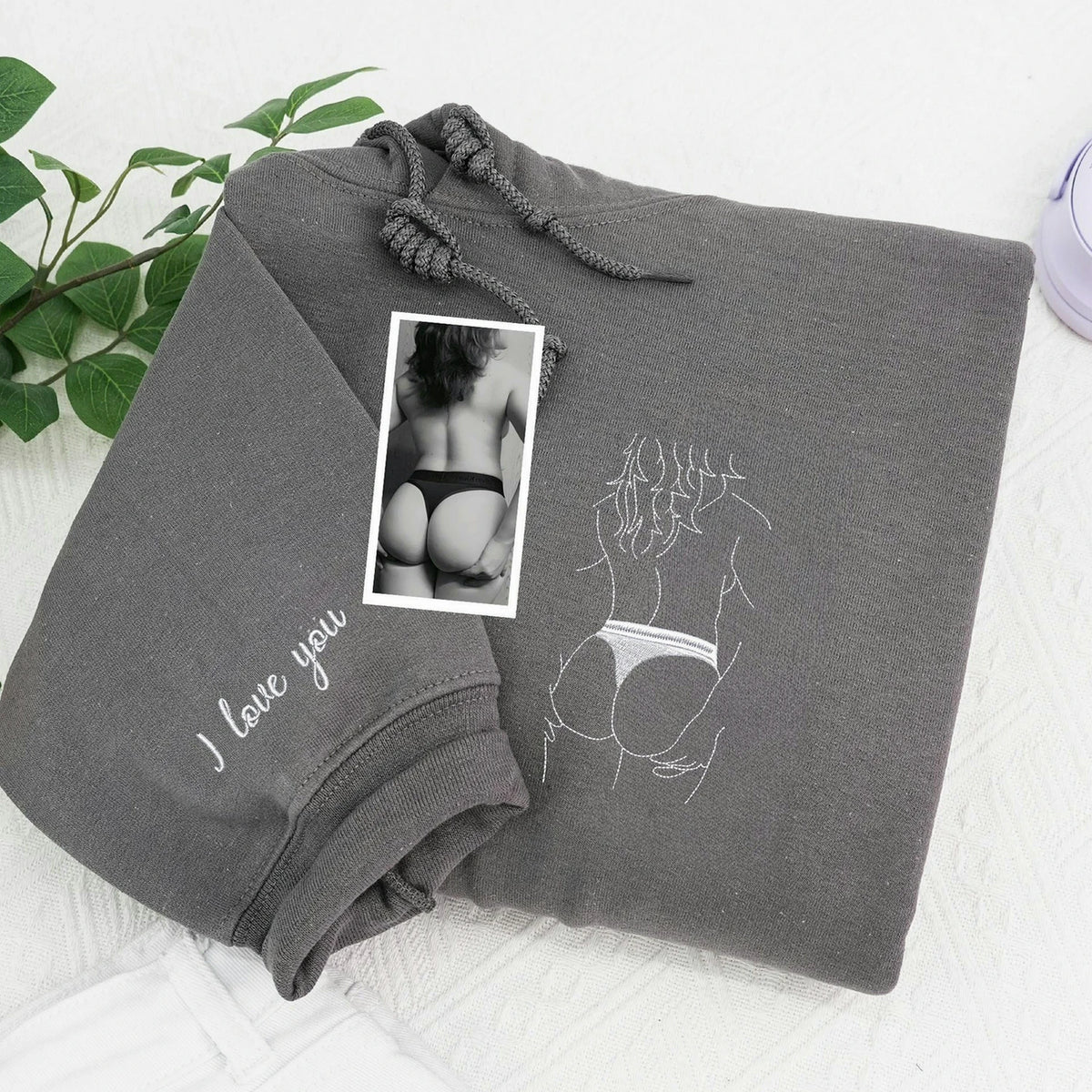 custom Dark Heather embroidered sweatshirt with spicy line art and a sleeve message, made as a romantic gift for him