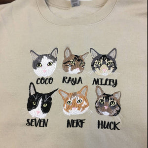 Embroidered Cat faces on sweatshirt 