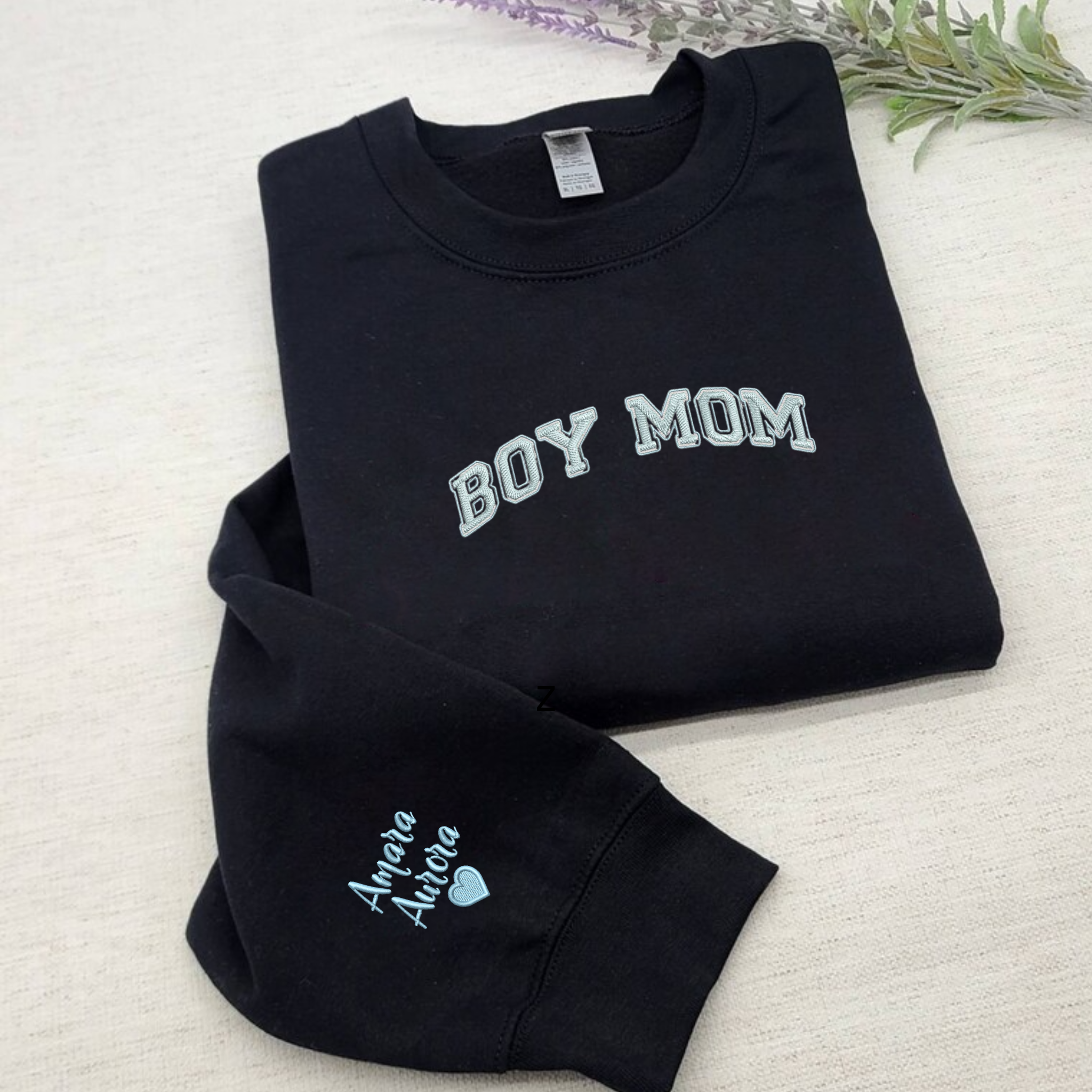 https://embroly.com/cdn/shop/products/custom-boy-mom-embroidery-sweatshirt-matching-mommy-and-me-crewneck-gift-for-mom_5000x.png?v=1680949857