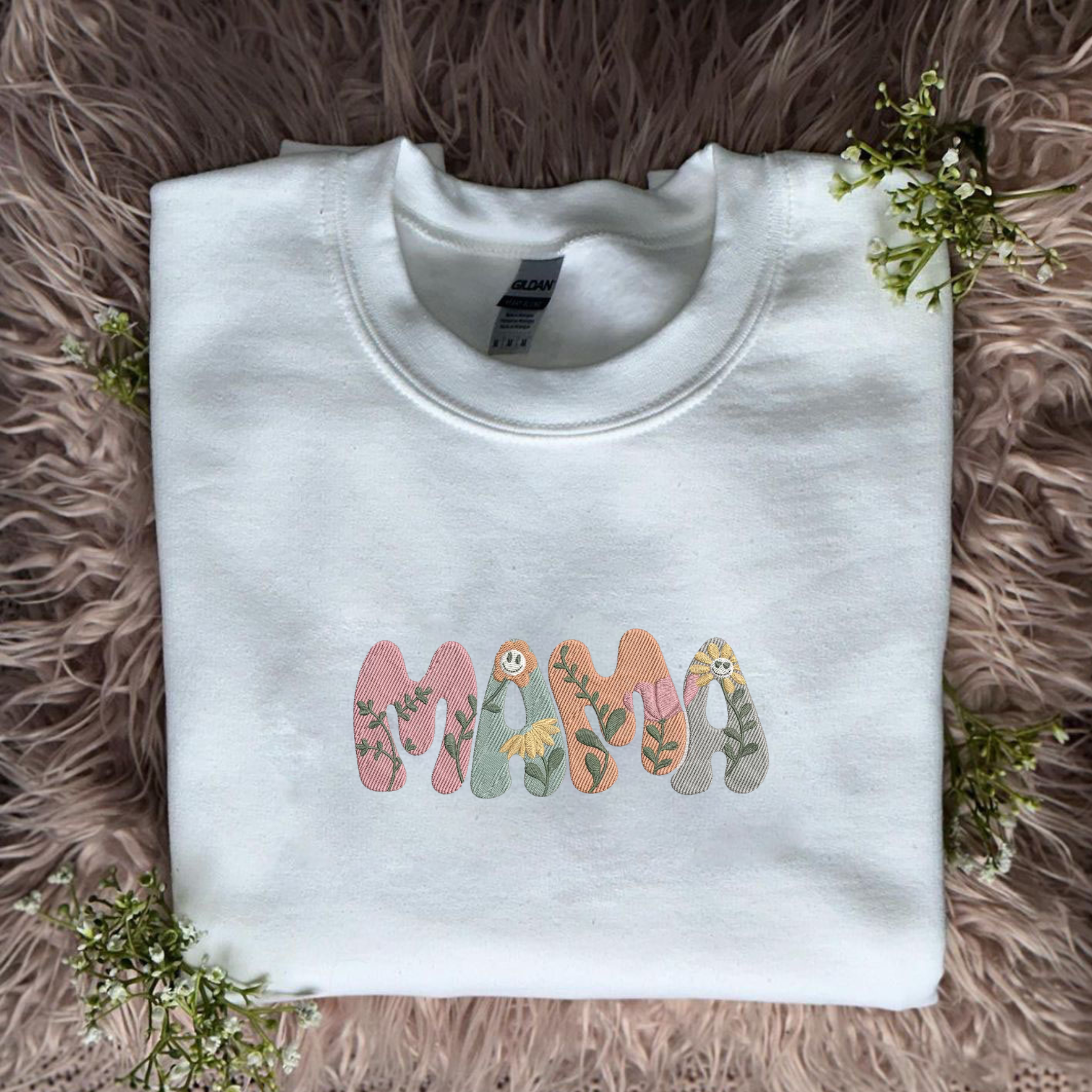 https://embroly.com/cdn/shop/products/custom-embroidered-mama-t-shirt-perrsonalized-shirt-with-embroidery-flower-letters-gift-for-mothers-day_5000x.png?v=1680941696