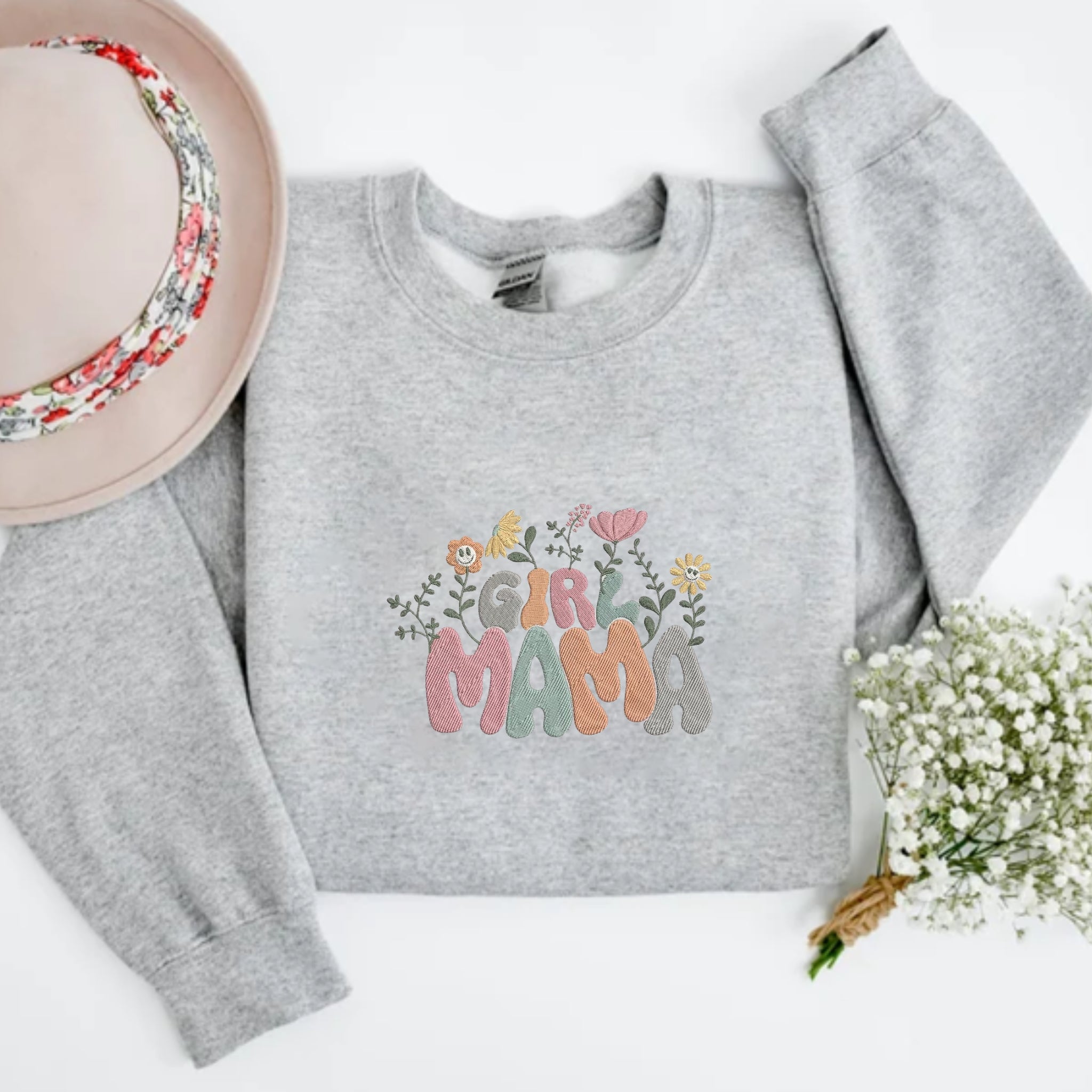 https://embroly.com/cdn/shop/products/embroidered-girl-mama-sweatshirt-mothers-day-embroidery-gift-floral-letter-embroidery_5000x.jpg?v=1680948136